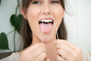Women Female used Eco tongue scraper 